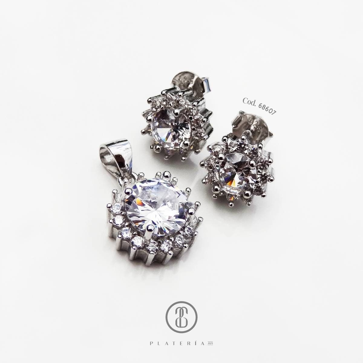 JUEGO RODINADO FLOR ZIRCON PLATA.925